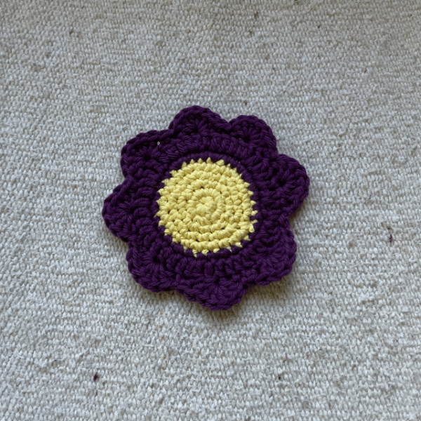 purple day flower coaster