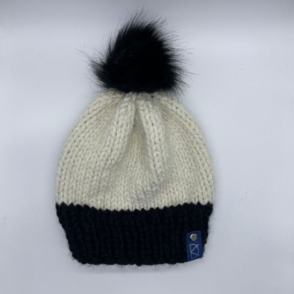 black and white with faux pom annies knit hat