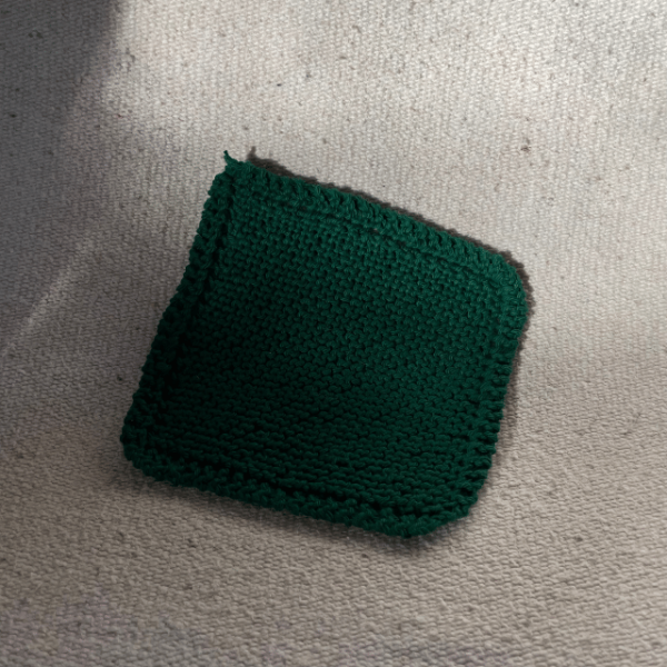 dark green mommoms knit dishcloth